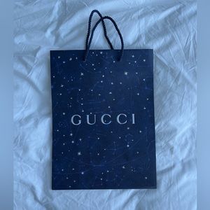 Gucci shopping bag with iridescent stars and logo